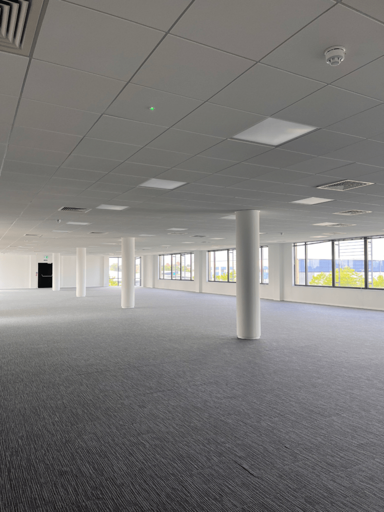 empty office space with supporting columns