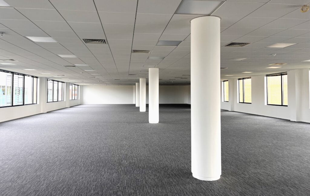empty office space with supporting columns