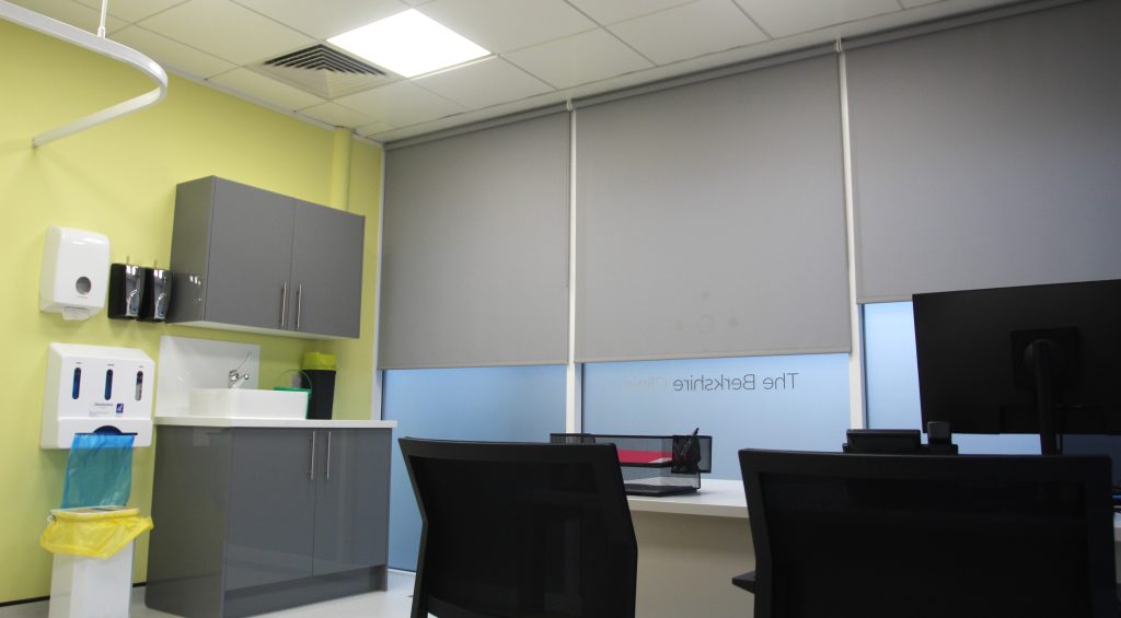 small office room with white square sink