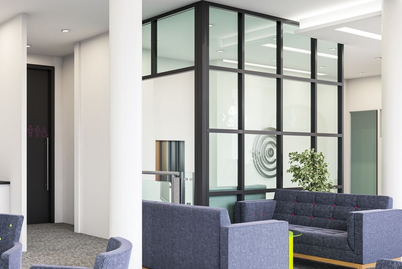 Two blue sofas facing each other in a waiting area.