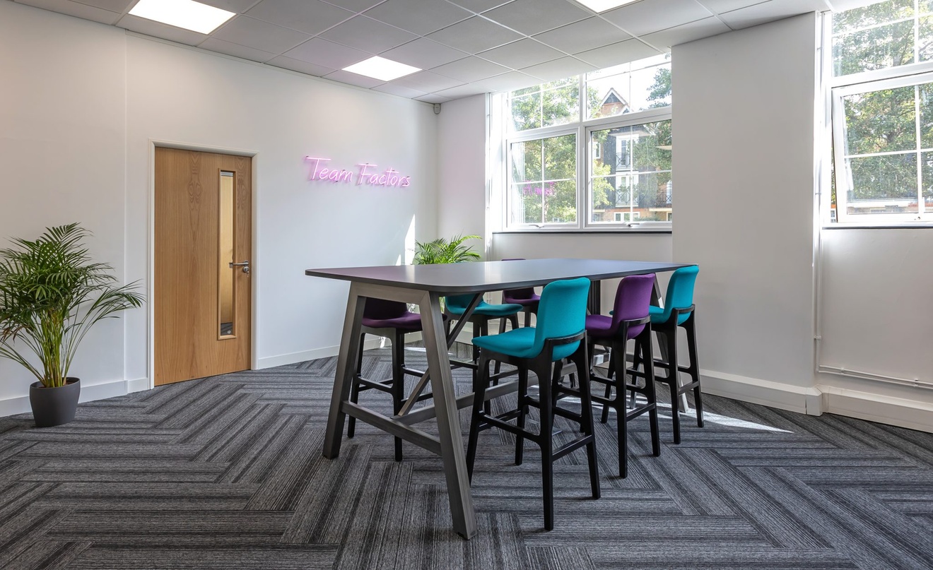 office table with blue and purple stools
