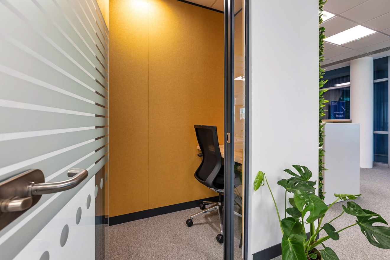 Image of a quiet booth with a yellow interior wall.