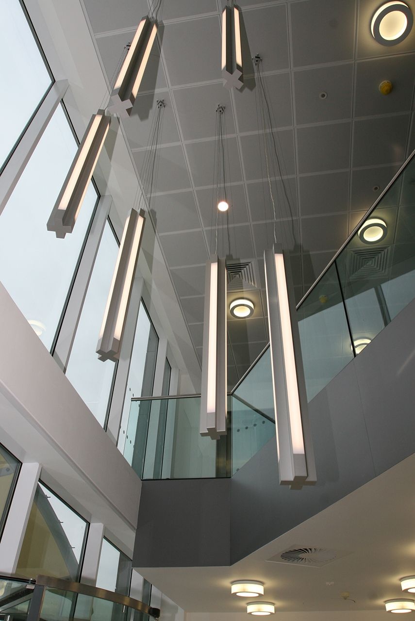 Custom lighting features hanging from a reception roof.