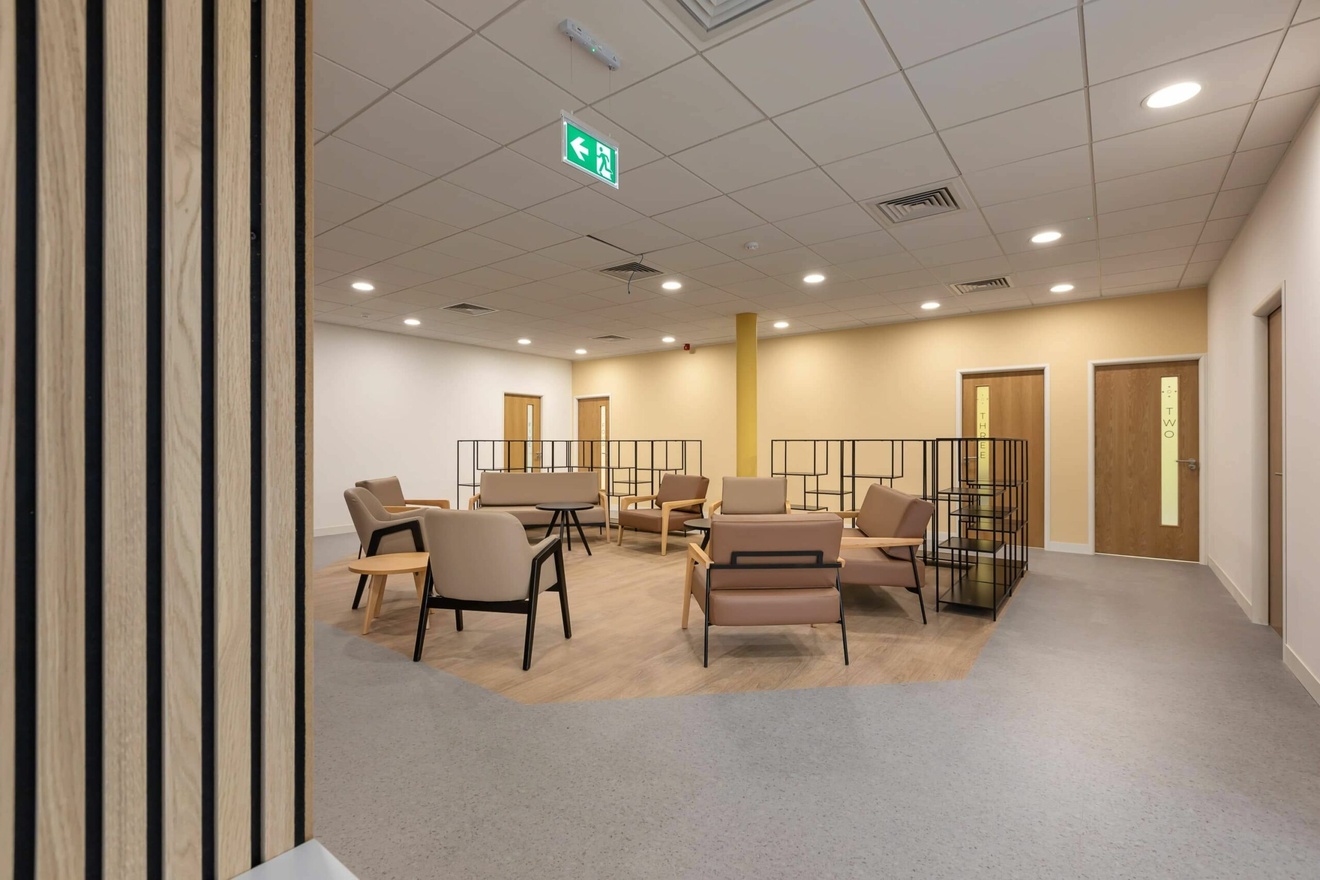 The Berkshire Clinic waiting area a collection of beige sofas and armchairs