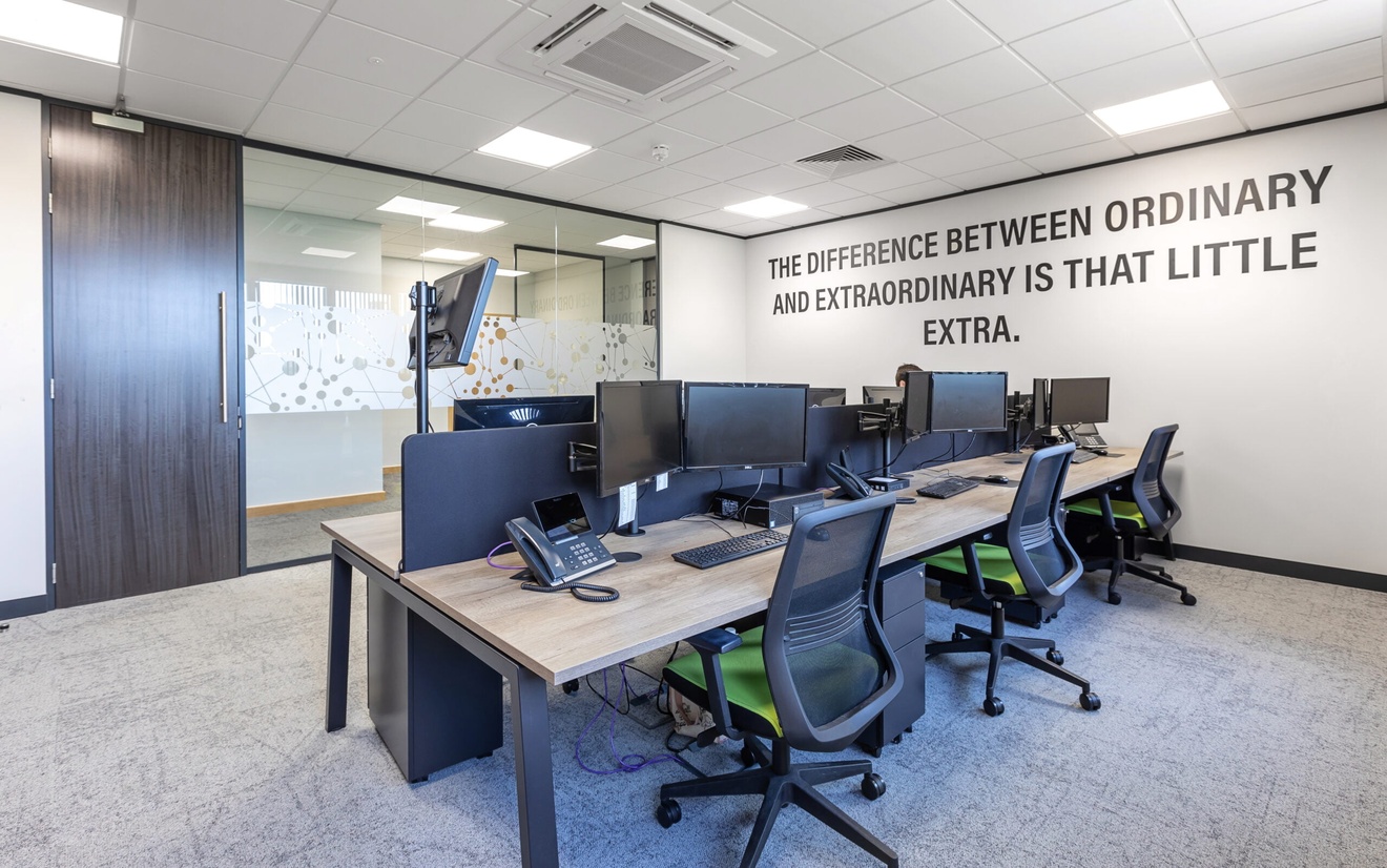 closed office space with desks facing each other